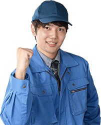 ガッツポーズをした作業員